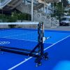 Filet pickleball PRO SKAYF installé sur terrain extérieur